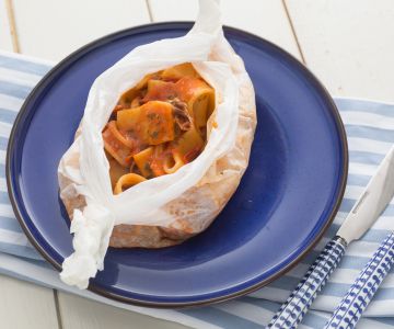 Calamarata (Pasta with calamari and tomato sauce)